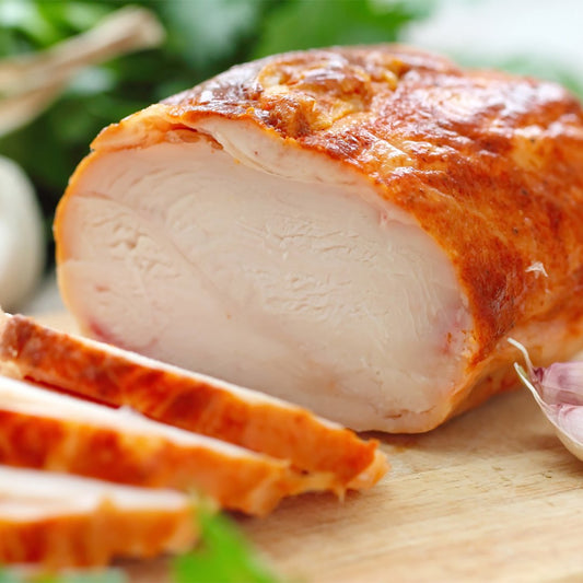 Smoked boneless turkey breast (approx. weight per breast, $12.99 per lb.)